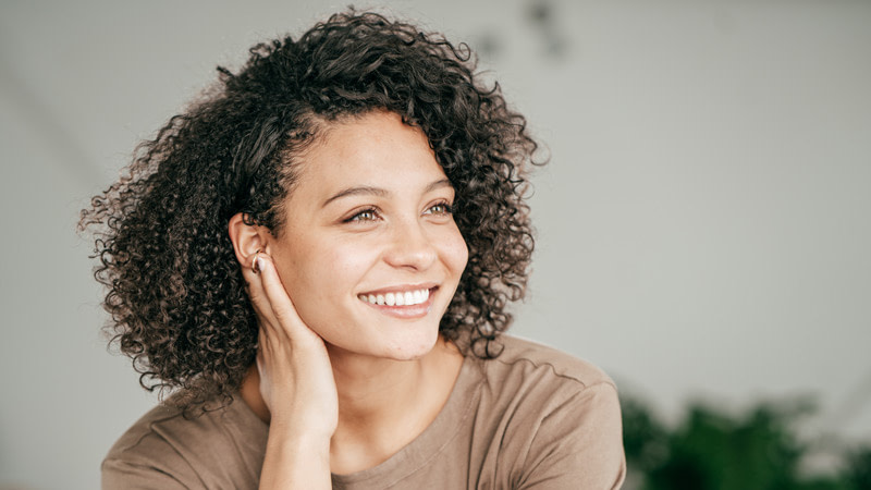 Smiling woman at dentist in south bend indiana